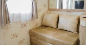 Best Furnished 2BR Mall Access at Green Pramuka Apartment By Travelio