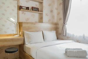 Best Furnished 2BR Mall Access at Green Pramuka Apartment By Travelio