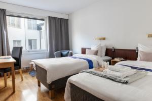 Large Twin Room room in First Hotel Stadt
