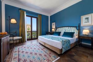 Double Deluxe Room with Balcony and Sea View room in Hotel Baglio Oneto dei Principi di San Lorenzo - Luxury Wine Resort
