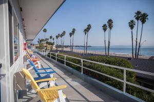 Deluxe Queen Room with Two Queen Beds and Ocean View room in Beach Street Inn and Suites