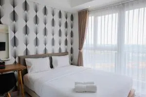 Homey and Comfy Studio Casa De Parco Apartment By Travelio - Samporo