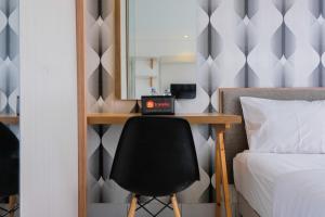 Homey and Comfy Studio Casa De Parco Apartment By Travelio