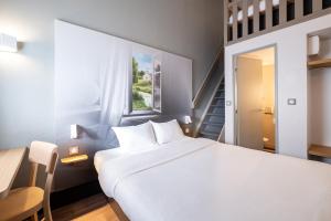 Hotels B&B HOTEL Lille Seclin Unexpo : photos des chambres