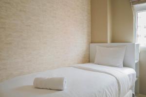 Cozy 2BR for 3 Pax Green Pramuka City Apartment By Travelio