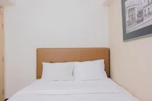 Homey and Luxurious 2BR 19 Avenue Apartment By Travelio - Buaran 2