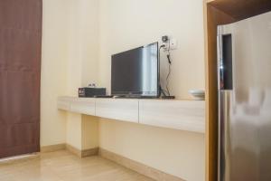 Minimalist and Comfy Studio at Menteng Park Apartment By Travelio