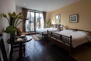 Centraltique Downtown - Bespoke Colonial House Near Hoan Kiem Lake