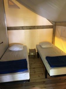 Campings Team Holiday - Camping du Petit Pont : photos des chambres