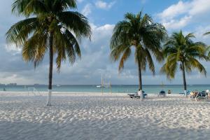Oceanfront condo at voted best Cancun sandy beach