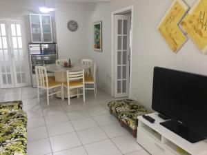 Apto frente praia Asturia Guaruja