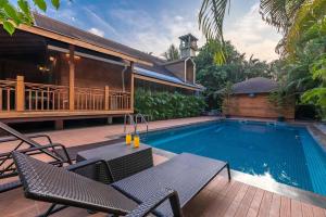 Natures Abode - The Wooden Villa at Morjim by StayVista