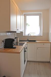 Moderne 1-Zimmer Wohnung mit Terasse, Küche, Bad mit Dusche, TV & WIFI