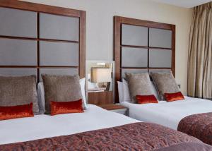 Superior Queen Room with Two Queen Beds room in Leonardo Royal London Tower Bridge