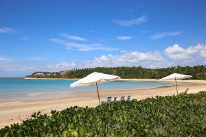 Charmoso bangalô balinês pé na areia Outeiro das Brisas
