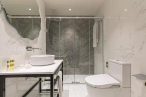 Double Room with Sofa Bed room in Eurostars Puerta Real