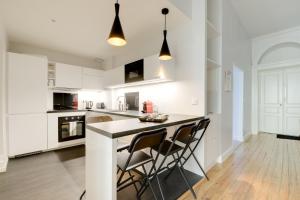 Appartements Le Palais Gallien : photos des chambres