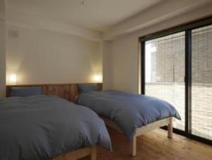 Guesthouse Hyakumanben Cross