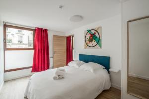 Appartements Bright and cosy flat at the heart of Paris in a trendy district - Welkeys : photos des chambres