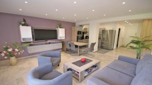 Appartements Les Saisons : photos des chambres