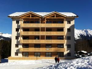 Appartements L'Eden Ski aux Pieds : photos des chambres