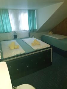 Triple Room with Shared Bathroom room in Hotel Haus Frieling