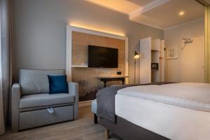 Comfort Double Room with Sofa Bed room in Hotel Franke
