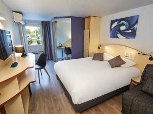 Hotels Kyriad Direct Bron Lyon Eurexpo : Chambre Triple avec 1 Lit Double et 1 Lit Simple - Occupation simple