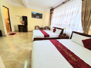 Phòng Tiêu Chuẩn 4 Người (Standard Quadruple Room)