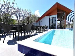 Palmyrah Surin Beach By Risa