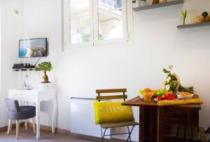 Appartements LE REFUGE avec terrasse et jardin, en plein centre-ville, gare 5 minutes a pieds : photos des chambres