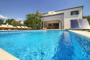 Luxury villa Medulin with pool near the beach , sea view, extra pool heating available