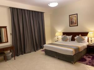 Executive One-Bedroom Apartment room in Baity Hotel Apartments