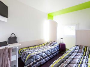 Hotels hotelF1 Limoges : photos des chambres