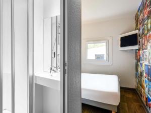 Hotels hotelF1 Saint Witz A1 Hotel : photos des chambres