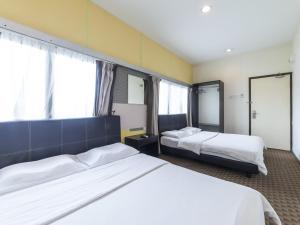 Comfort Quadruple Room room in Raintree Hotel