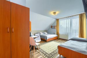 Triple Room with Balcony room in Pokoje U Artura