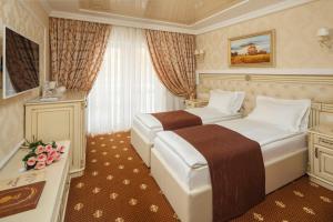 Deluxe Double or Twin Room with Balcony and Spa Access room in Chevalier Hotel & SPA