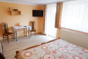 Pokoje Gościnne "Adam"