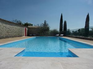 B&B / Chambres d'hotes Gite le MAGNAN, 55 m2, havre de paix, terrasse, jardin, piscine chauffee, sud Ardeche : photos des chambres