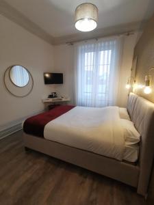 Appartements Colmar Suites - Residence : photos des chambres