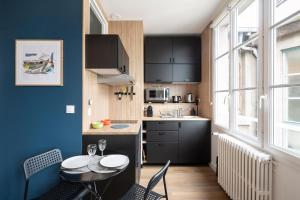 Appartements Le Cinq by Cocoonr : photos des chambres