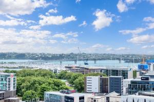 Cityscape Charm Apt w Parking, Views, Pool & Gym