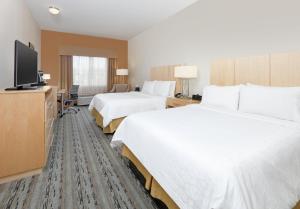 Queen Room with Two Queen Beds room in Holiday Inn Express & Suites San Antonio Brooks City Base an IHG Hotel