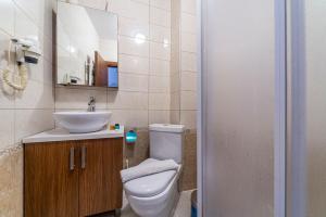 Comfort Triple Room with Kichenette room in Carina Apart Hotel