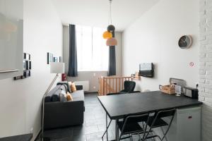 Appartements Au detour des Places : photos des chambres