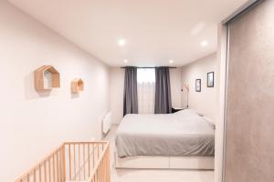 Appartements Au detour des Places : photos des chambres