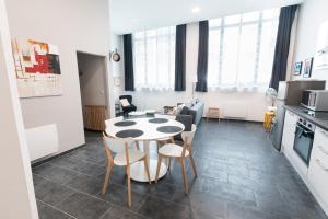 Appartements Au detour des Places : photos des chambres