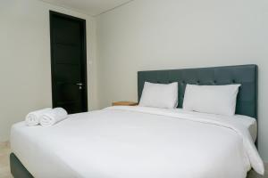 Modern 2BR with Private Lift at Masterpiece The Epicentrum Kuningan Apartment By Travelio