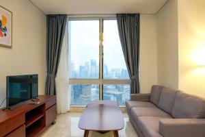 Modern 2BR with Private Lift at Masterpiece The Epicentrum Kuningan Apartment By Travelio